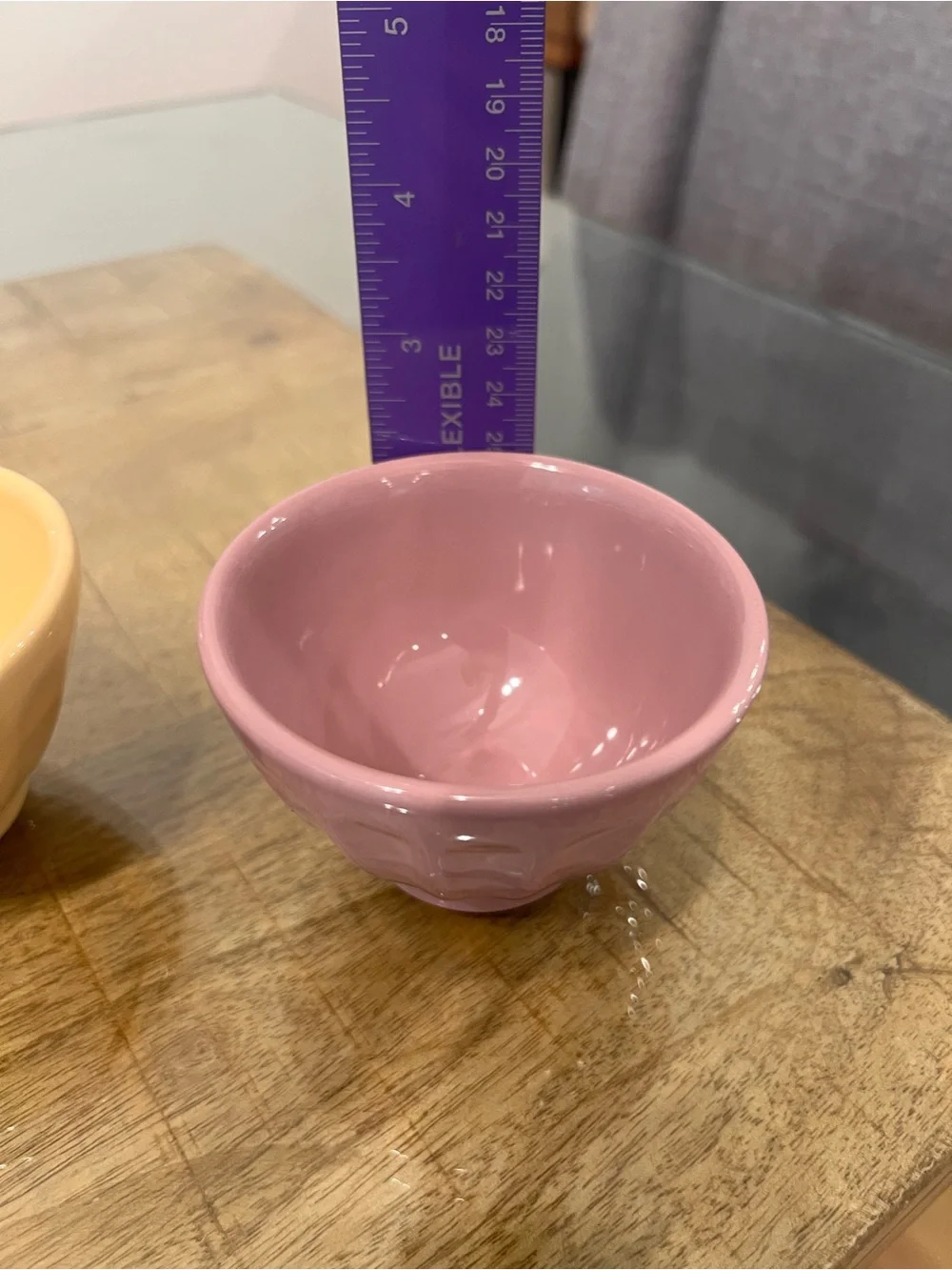 3 Anthropologie glazed ceramic bowls in peach, yellow, and mauve